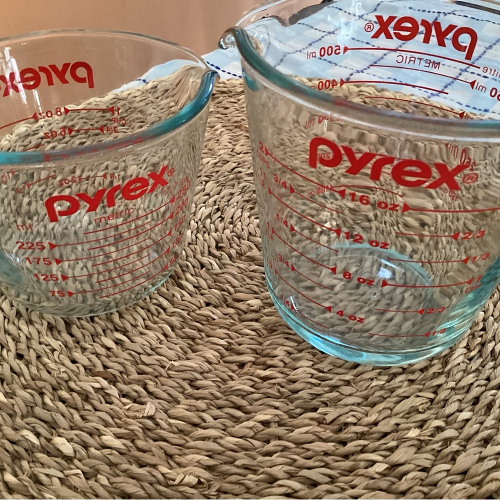 2 Pyrex Red and Clear Glass Measuring Cups